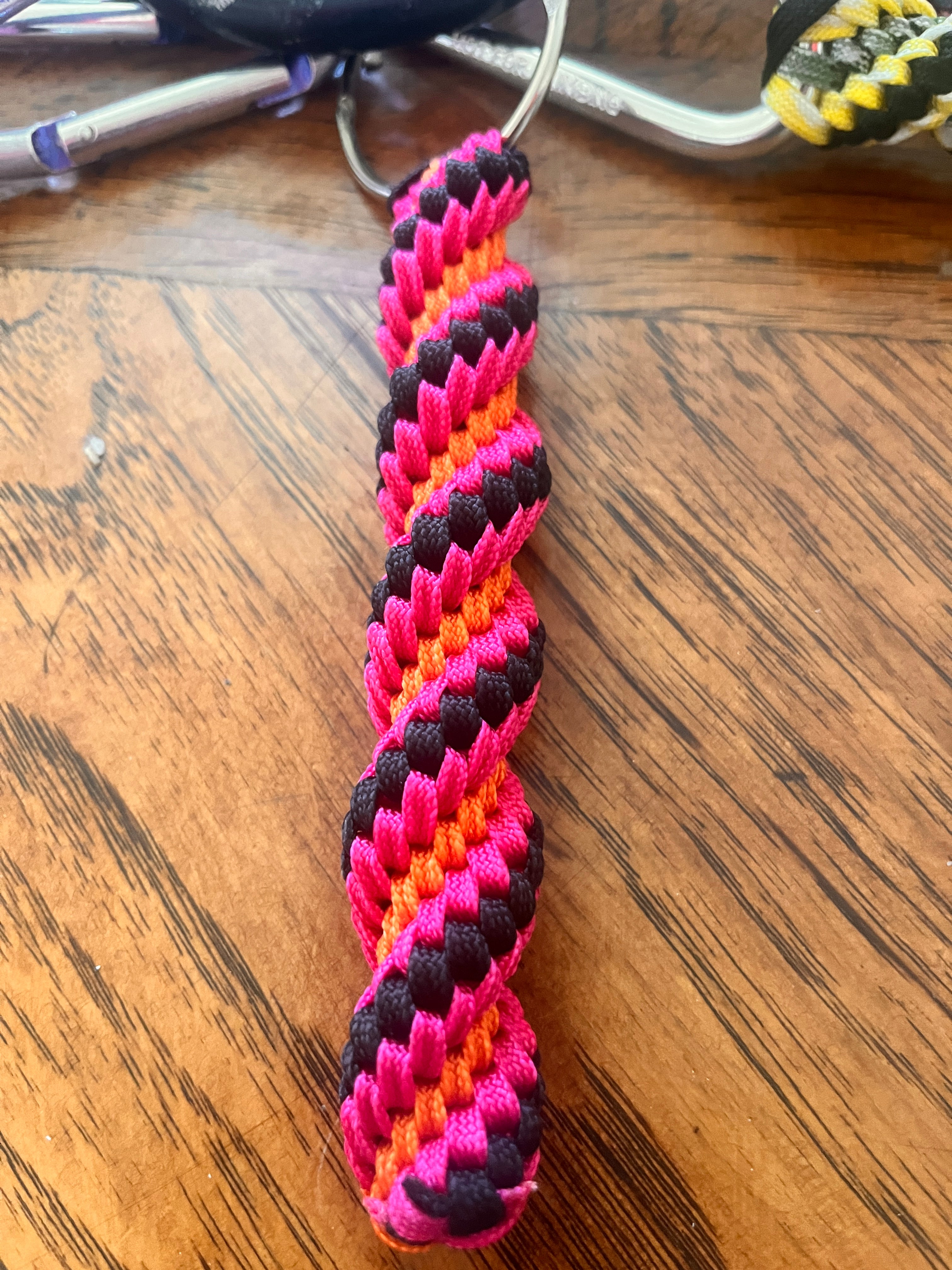 5"(13cm) 4-string Artisan Handwoven Helix Spiral Paracord Collectible Keychain – Black, Pink and Orange