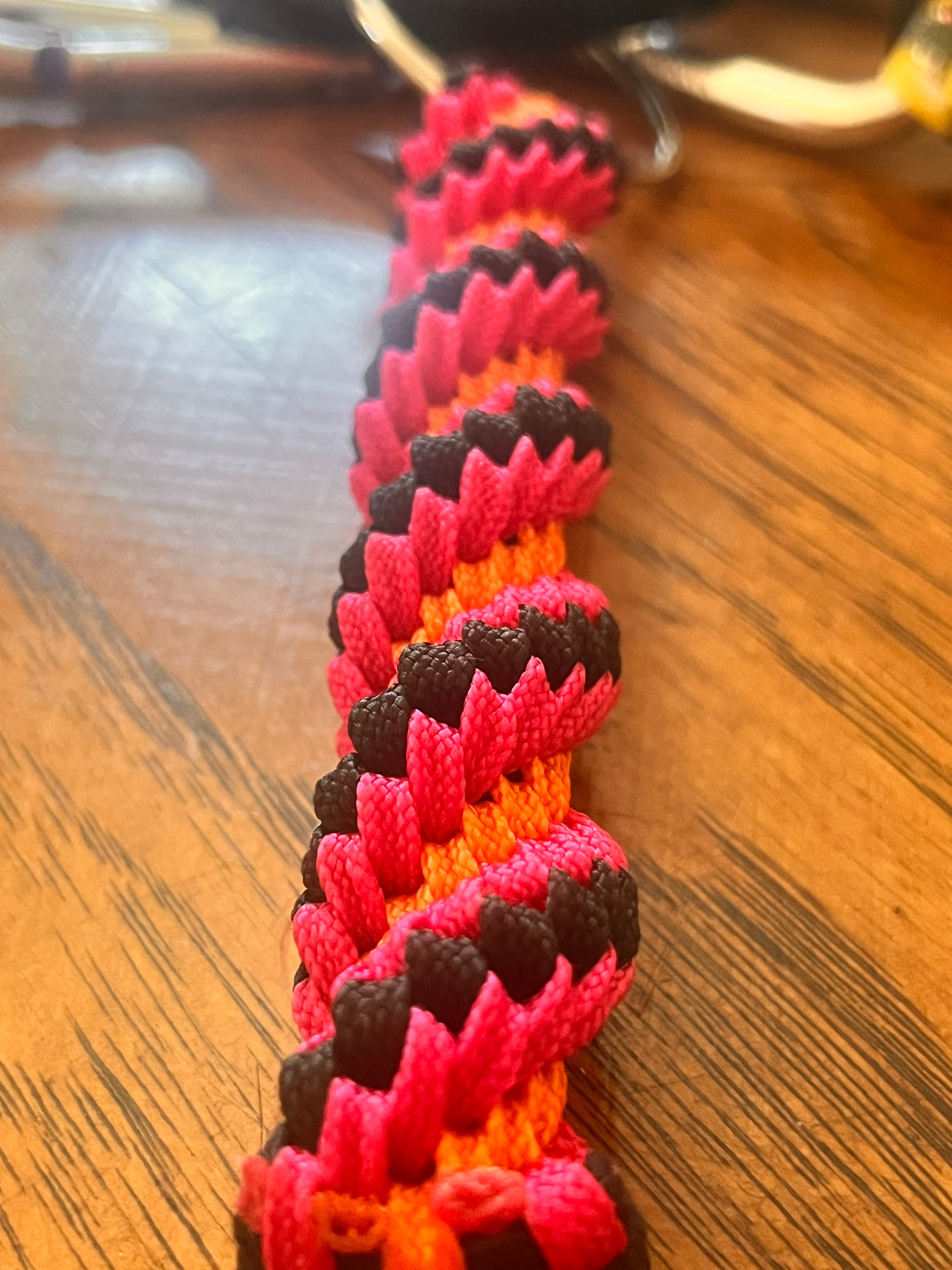 5"(13cm) 4-string Artisan Handwoven Helix Spiral Paracord Collectible Keychain – Black, Pink and Orange