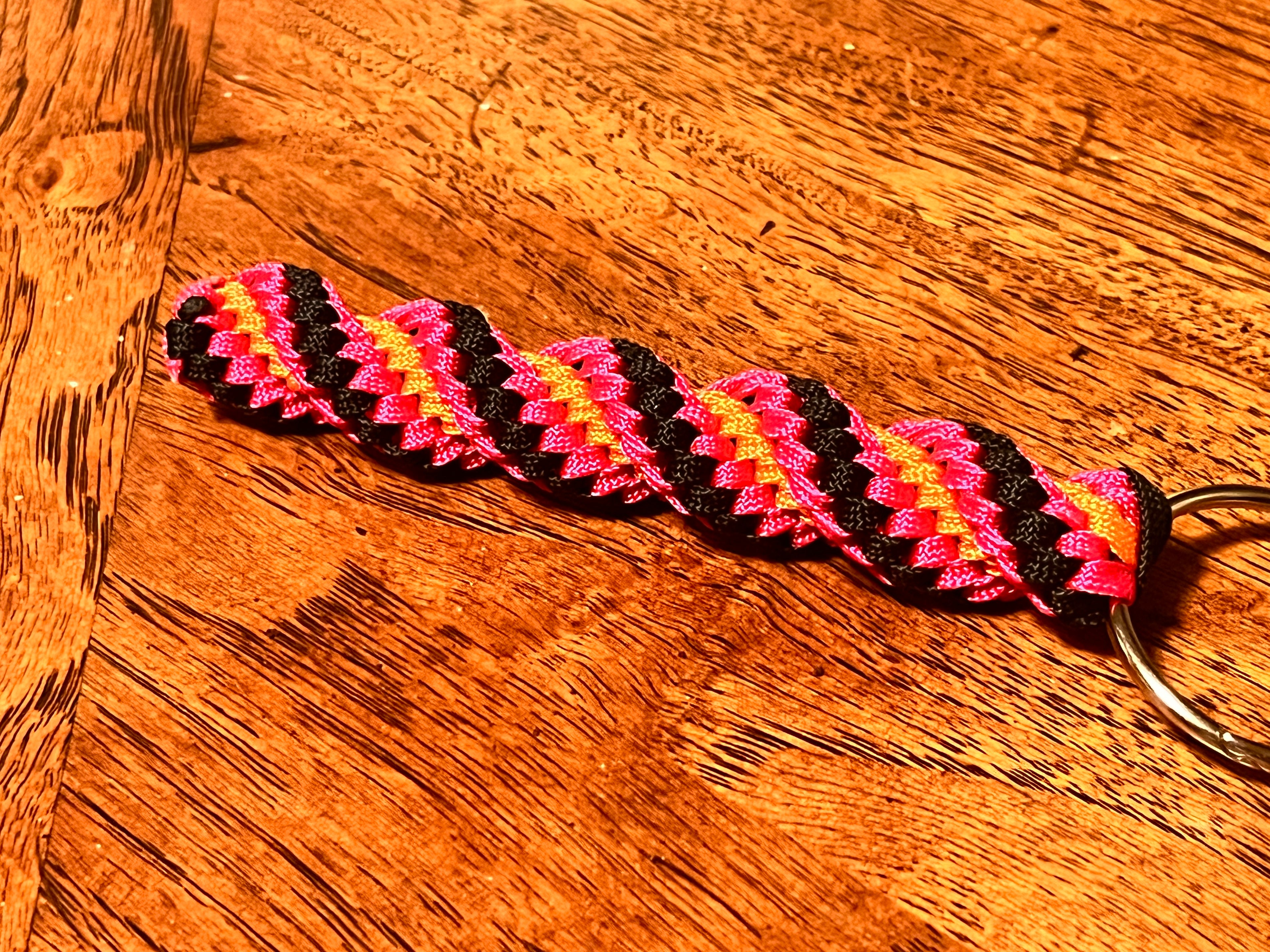 5"(13cm) 4-string Artisan Handwoven Helix Spiral Paracord Collectible Keychain – Black, Pink and Orange
